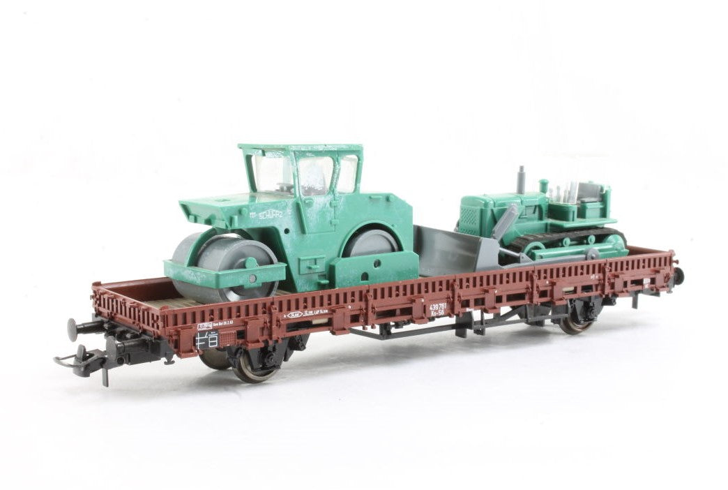Stake Wagon with Construction Roller and Excavation Load