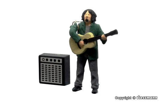 Street Guitarist with Amplifier, Moving