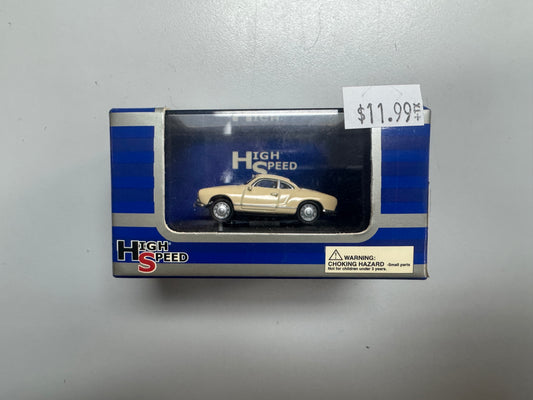 High Speed VW Cream Coloured Karmann Ghia Coupe